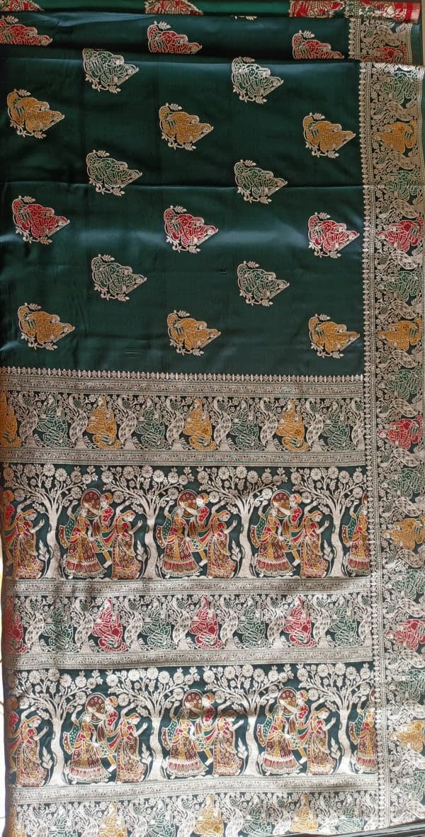 Model Draping the Bottle Green Vrindavan Raas Leela Silk Saree with Matching Blouse